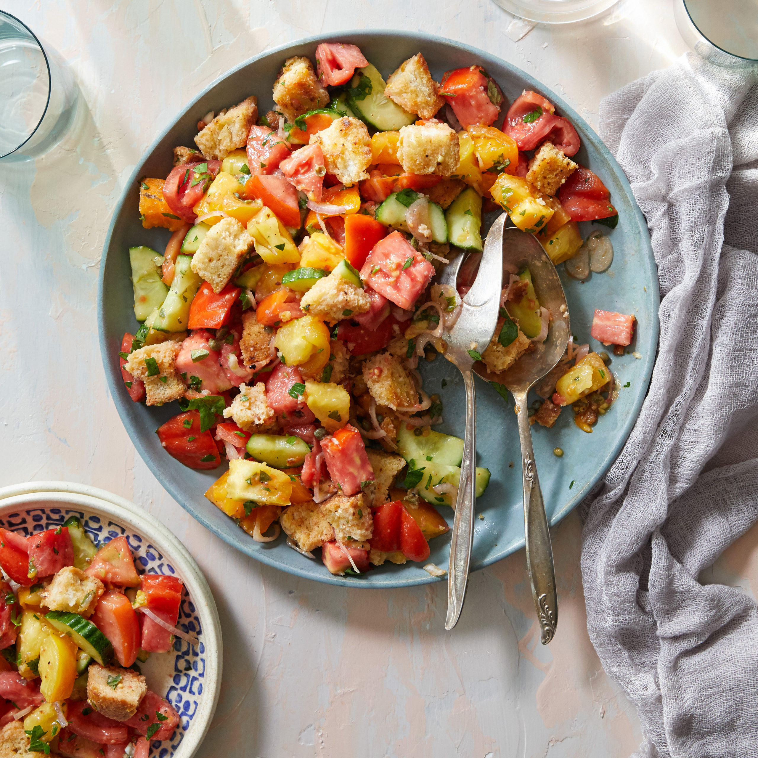 Photo of Sheela Prakash's panzanella, a salad with bread, tomatoes, cucumbers, onions and capers.