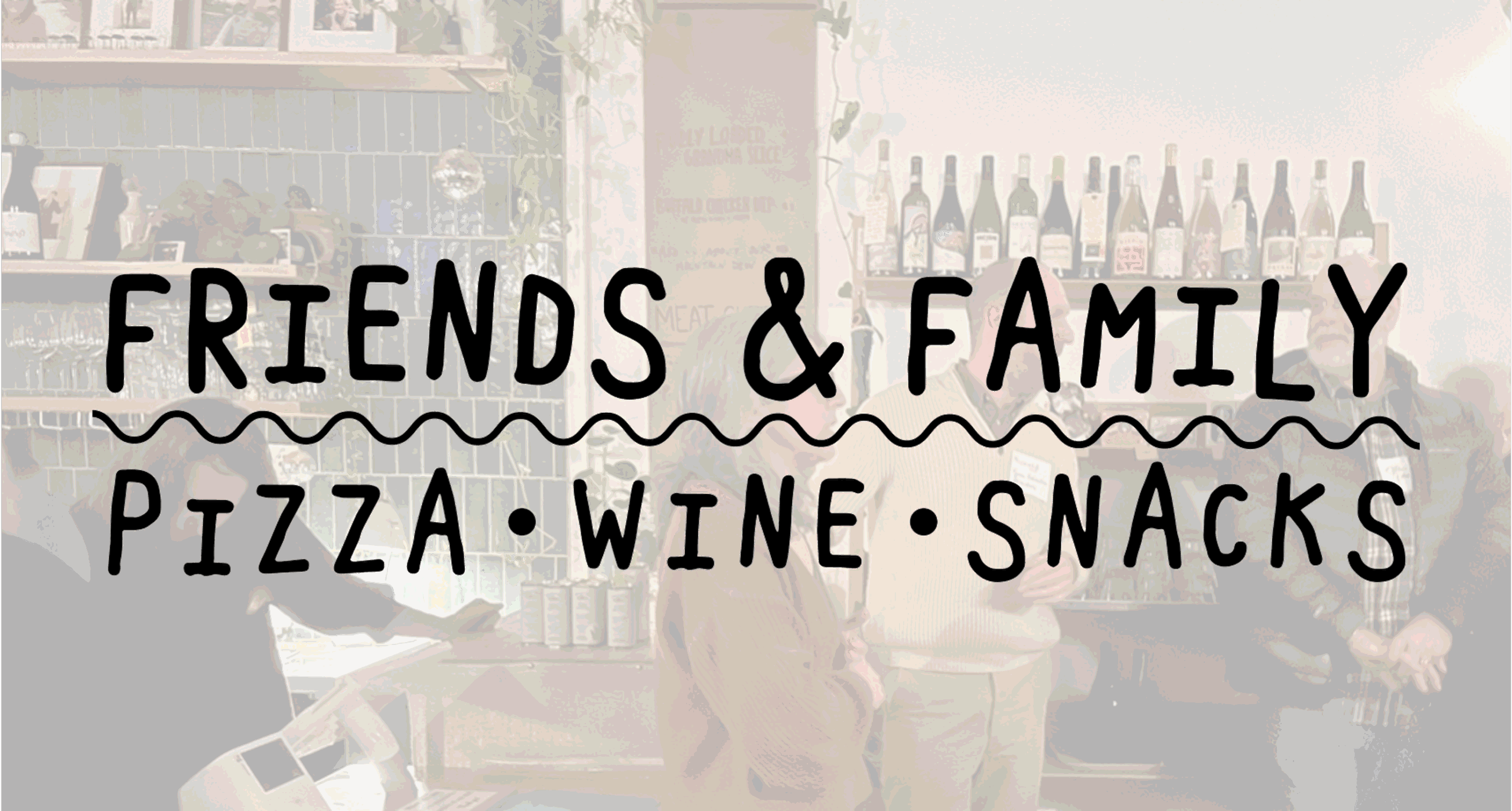 The logo for Friends & Family overlaid on a photo of our event at Friends & Family last year
